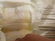 Pissing in open adult diaper