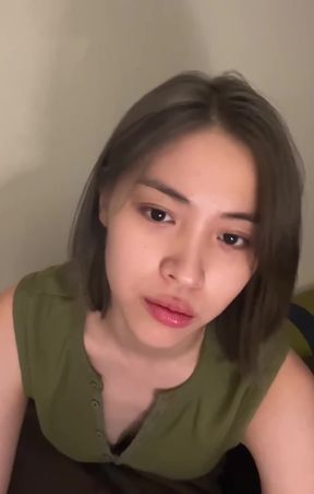 Korean babe exposes her lips for a close-up view