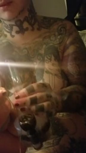 Chubby tattooed big tits almost got caught smoking naked.