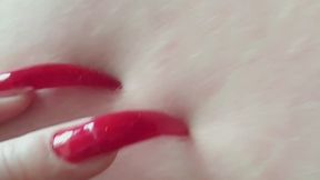 I scratch my slaves body on various parts with hot red nails