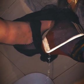 Soaking my sissy slutty nylon feet and heels