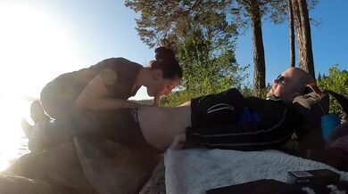 Norwegian slut gags on thick cock outdoors by lake