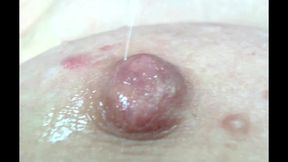 Very close-up shots of a mature slut's pussy with purple hair and other parts of her slutty body...))