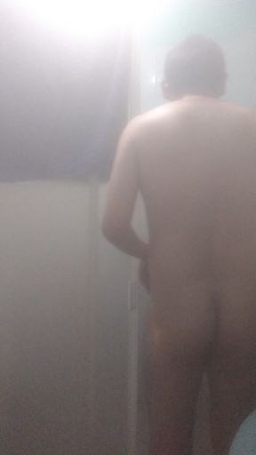 Naked man in shower