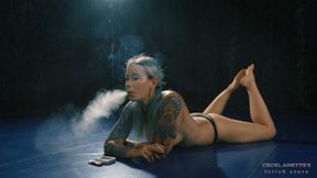 Smoking on the blue mat 4K MP4