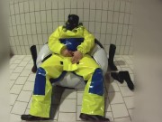 Pup pawing in Pros Extreme waterproof gear