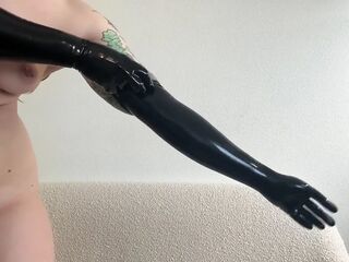 Hawt Domina Redhead Teases in Latex Opera Gloves and Haunch High Boots