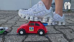 Two Cars under merciless Sneakers