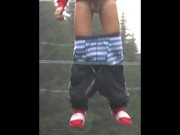 Teen shows his big cock for fun on a trampoline at the camp