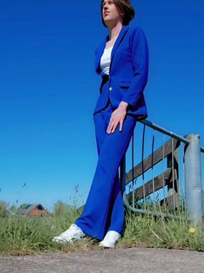 Annemieke in Blue Suit Pissing Outdoor