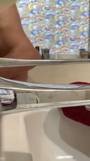 Spying on a fit girl when she has a great orgasm in the shower   Clip 1