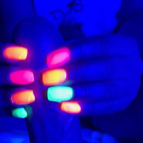 Black light glowing nail handjob