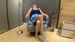 Crossed legs orgasm in furniture store