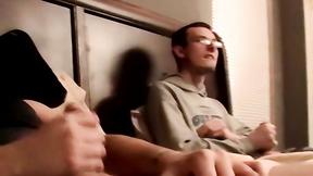 ”Two amateur freaks jerk off together in a cheap motel room”