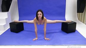 Slender Russian teen Galina Markova does the splits and shows bald pussy