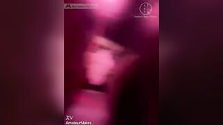 Amateur man lending forearm to his homie peeing in public toilets' urinal