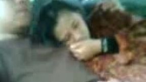 Amateur woman giving head on a back seat in a car