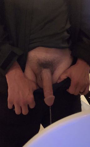 pissing in public bathroom