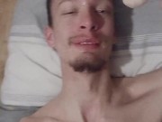 Skinny skinhead gives his dildo a sloppy blowjob and enjoys slapping dildo all around himself