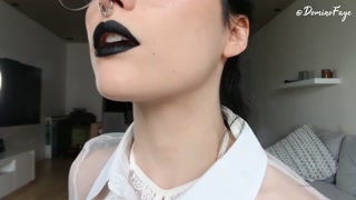 Putting on black lipstick for your pleasure by Domino Faye