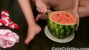 Cute Cristina plays naked with watermelon