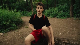 Summer Walk. College friends active recreation outdoors. Play rackets and shuttlecock