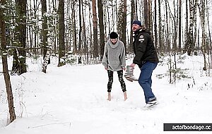 Naked barefoot Claudia tied up in the snow