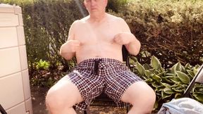Outside in my yard, naked and masturbating