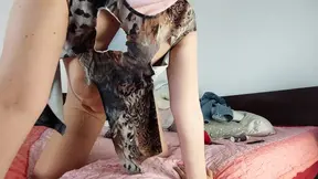 Amateur wife has fun trying on clothes that she tears