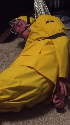 Stunning moment from "Yellow PVC Rainsuit Self Bondage"