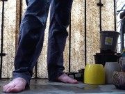 Desperate pee in jeans on the balcony
