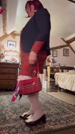 Dressed in a little plaid dress for an evening