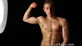 Dreamy Gay Hunk Posing and Flexing His Muscles Seductively