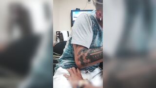 Black, tatted boy bellowing in ache from the tat .