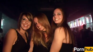 College girls dance in fishnets at a wild public party