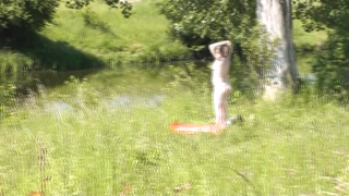 Outside. Wild beach. Random passerby man by river saw naked woman sunbathing. Outdoor. Nudist