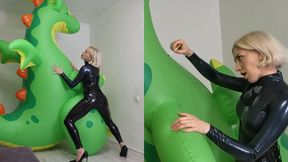 Blonde smoking and destroying huge inflatable dragon