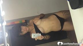 Horny stepdaughter records herself in the bathroom