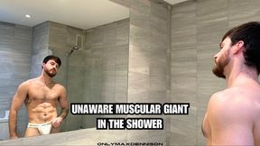 Unaware muscular giant in the shower