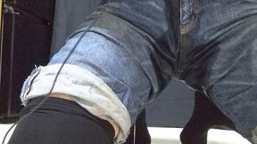 A dude's daughter-in-law-in-law wearing jeans leaked pee while frolicking with an electric vibrator.