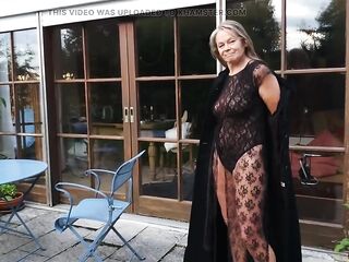 A Older Woman Shows off Her Figure Outside in a Lace Bodysuit!