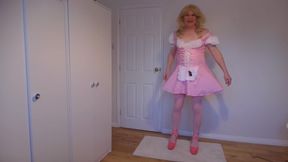 Close up of a cute blonde in pink dress and no panties