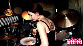 Tattooed lesbian masturbates