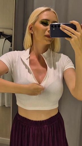Key moment from "Trying on completely transparent clothes in the fitting room. Look at my boobs in a public place."