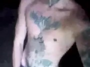 Horny inked twink smokes and flashes hard cock