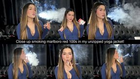 Close up smoking marlboro red 100s in my unzipped yoga jacket!