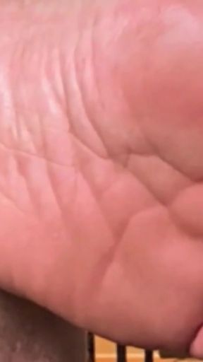 Emotional moment from "Sniff my sneaks, socks, and bare toes"