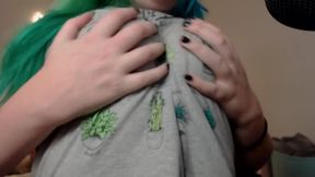 Pear takes a break to roll a joint while her partner whispers softly in her ear.