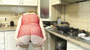 Busty MILF seduces in the kitchen, fingerfucks herself