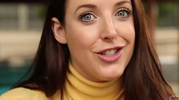 Angela White in Yellow Sweater